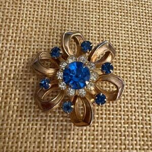 Vintage Gold Tone Blue Rhinestone Flower Brooch Pin Mid Century Costume